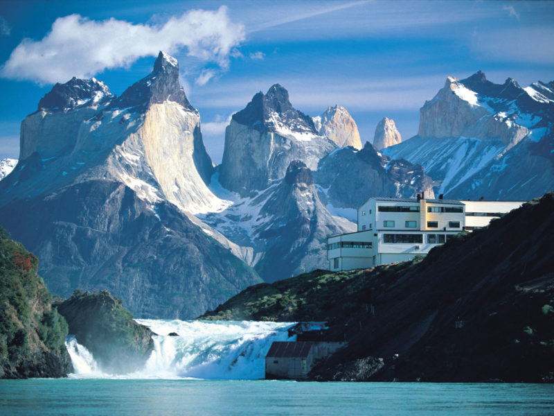 Explora Salto Chico hotel, overlooking Lake Pehoé, the Salto Chico waterfall and the Torres del Paine range.