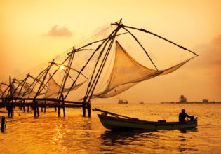 Sunset over Chinese fishing nets in Fort Kochi India.