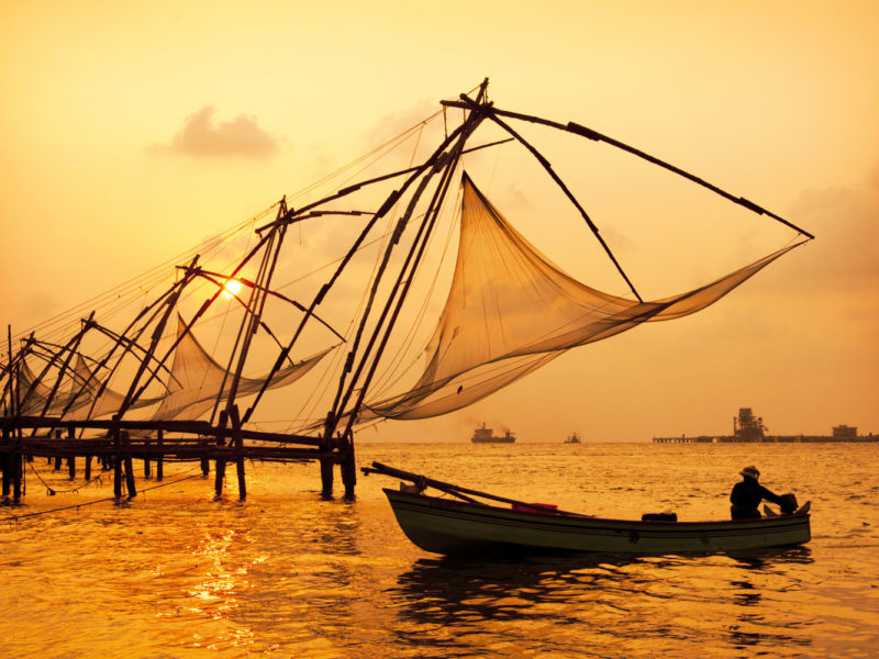 Sunset over Chinese fishing nets in Fort Kochi India.