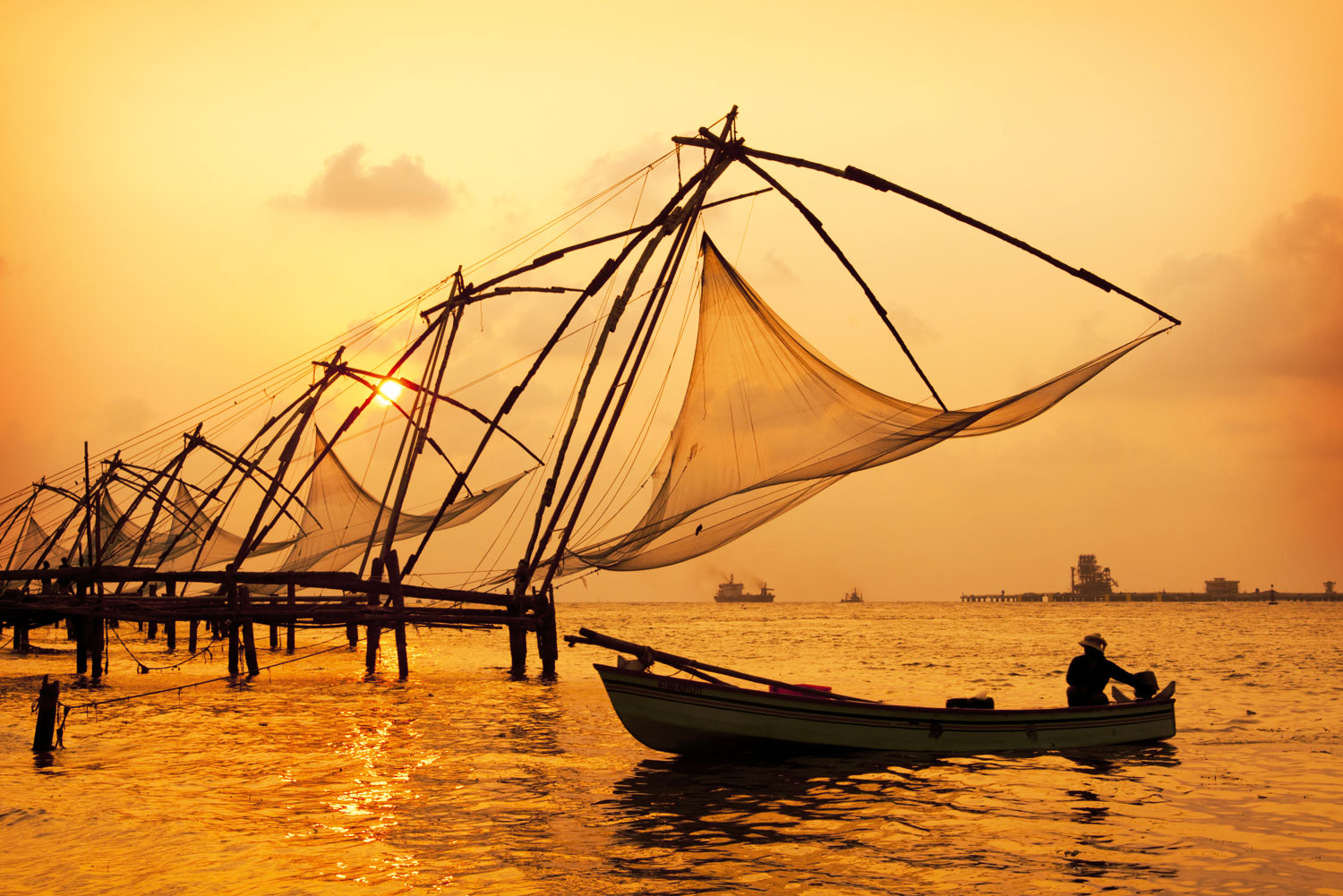 Sunset over Chinese fishing nets in Fort Kochi India.