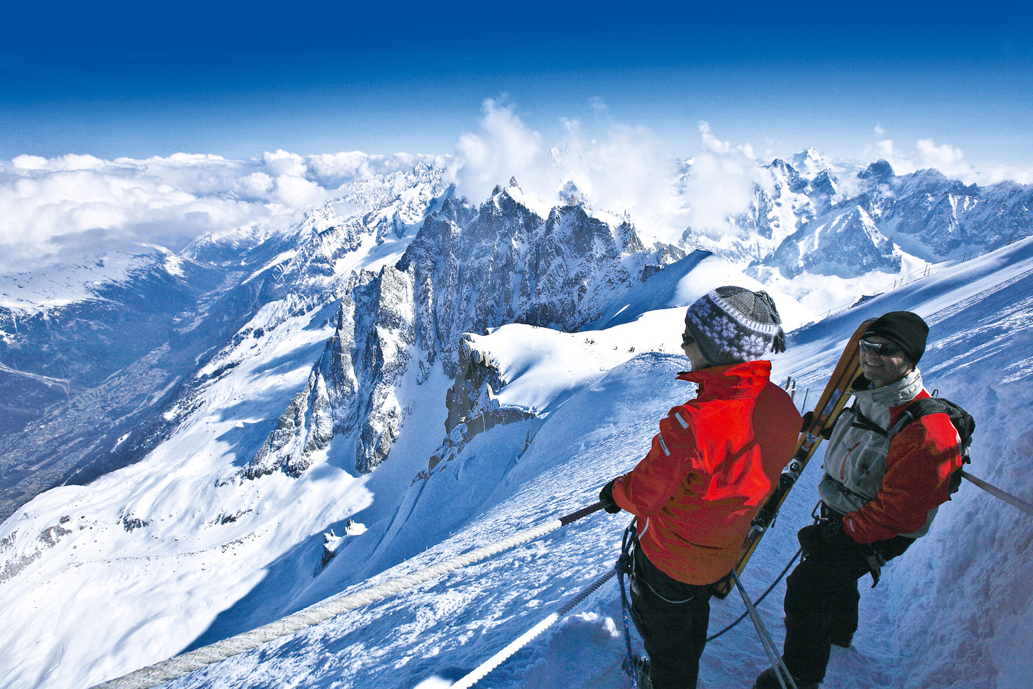 Skiers enjoying the view from Mont Blanc, France.