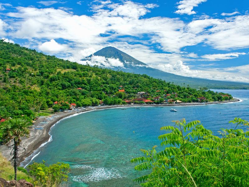 Amed in Bali's northeast, with Agung volcano in the background.
