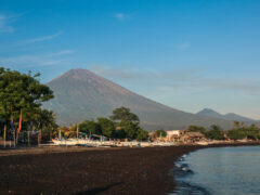 a black sand beach in Amed, Bali