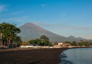 a black sand beach in Amed, Bali