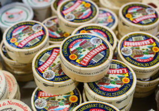 Boxes of Camembert de Normandie from Fromagerie Graindorge, France.