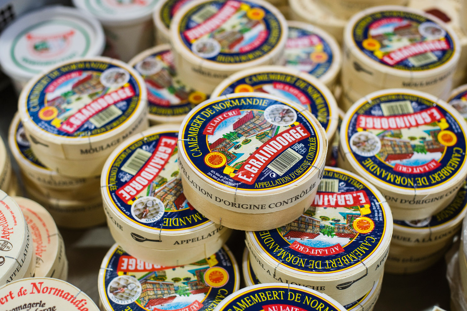 Boxes of Camembert de Normandie from Fromagerie Graindorge, France.