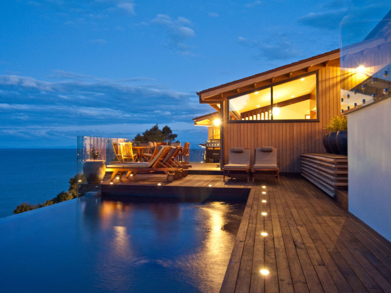 Split Apple Retreat - set high on a cliff-face on the seaside border of Abel Tasman National Park, on New Zealand’s South Island.