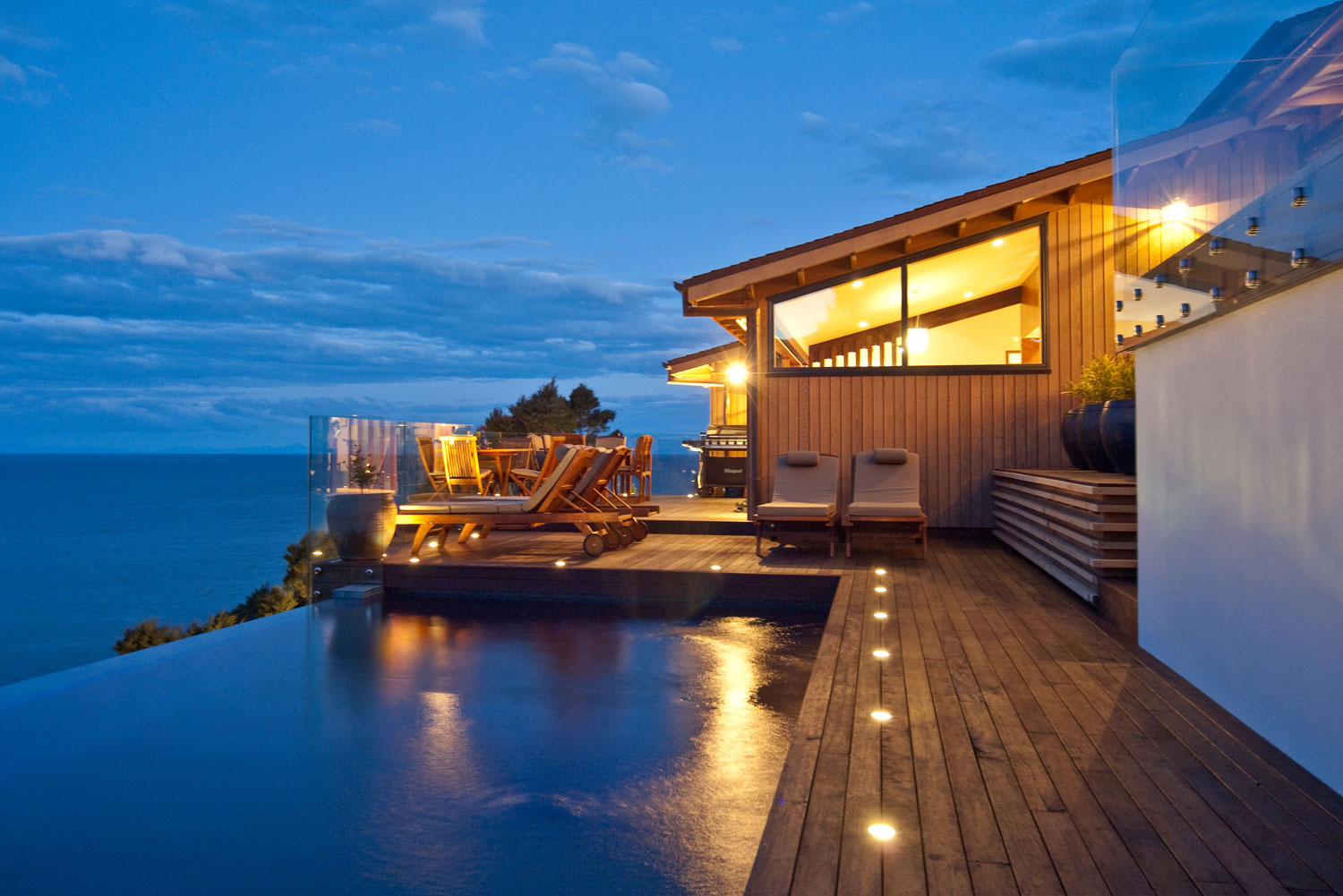 Split Apple Retreat - set high on a cliff-face on the seaside border of Abel Tasman National Park, on New Zealand’s South Island.