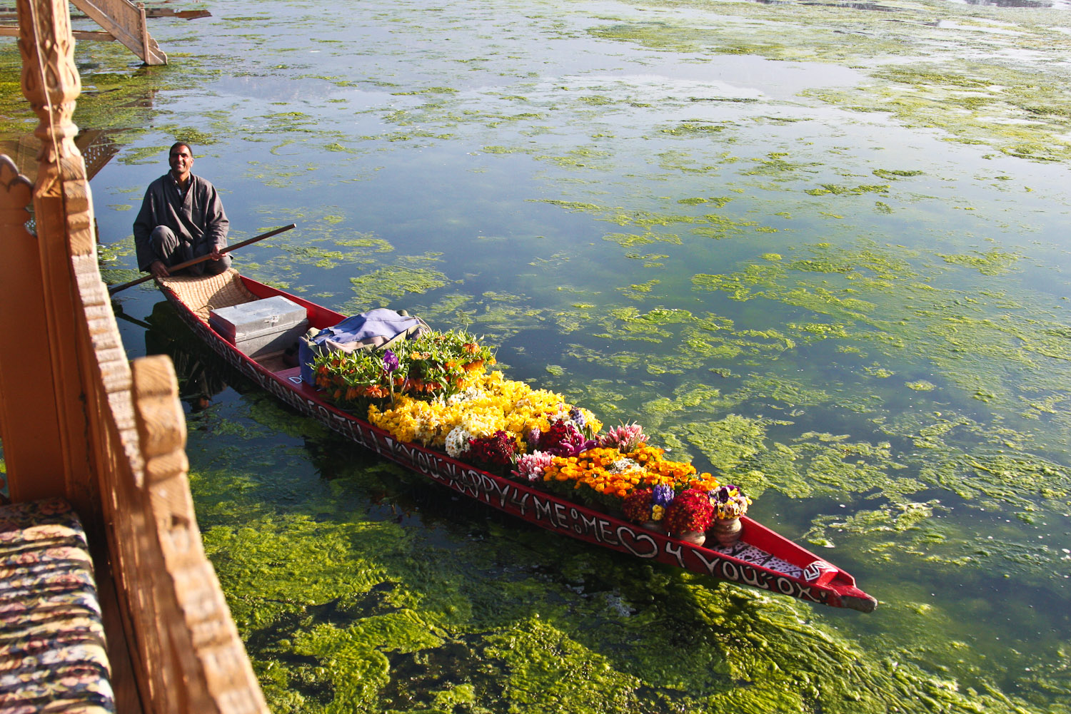 A flower seller on Kashmir's Nagin Lake.