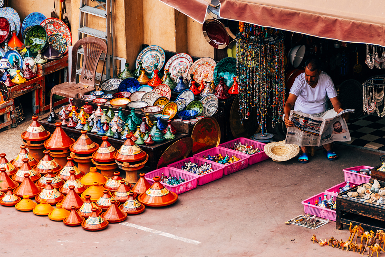 Street vendor selling moroccan handicrafts at Marrakech Medina