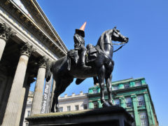 Duke of Wellington statue sporting a traffic cone.