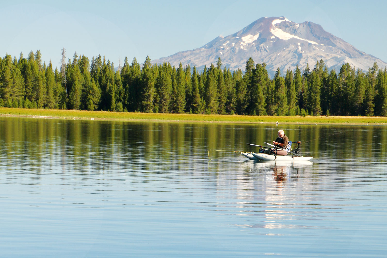 Fly fishing on Crane Prairie in Bend, Oregon.