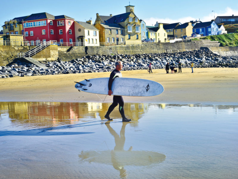 American surfer Shawn Hickey heading out for one of his first rides in Ireland at Lahinch.