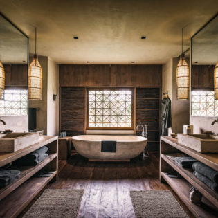 Phum Baitang hotel's guest bathrooms.