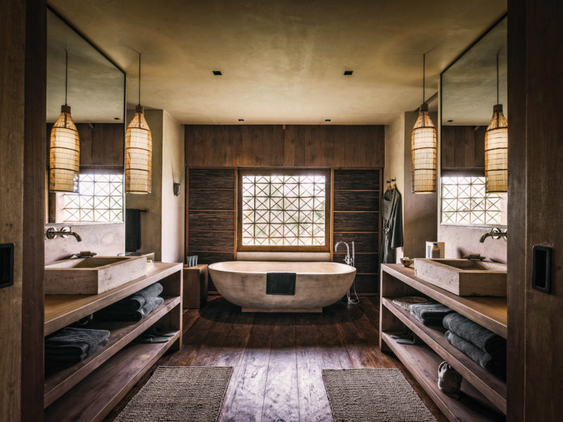 Phum Baitang hotel's guest bathrooms.