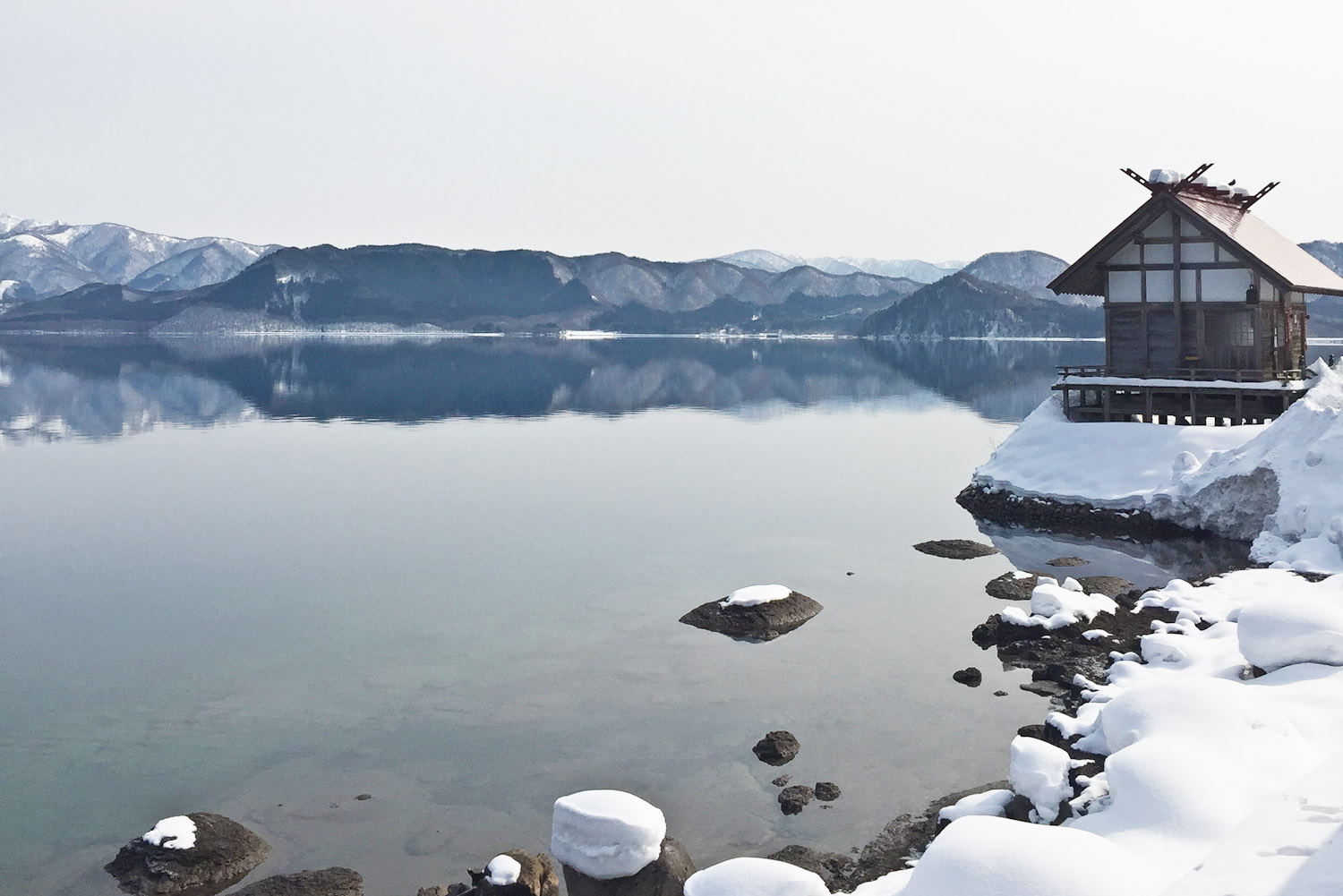 Shinto shrine on the shores of Lake Tazawa, Japan.