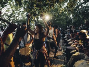 People dancing with drummers