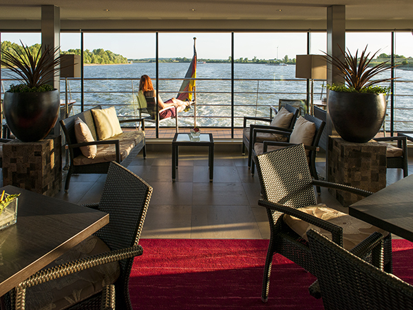 Inside of river cruise boat with lounge and chairs