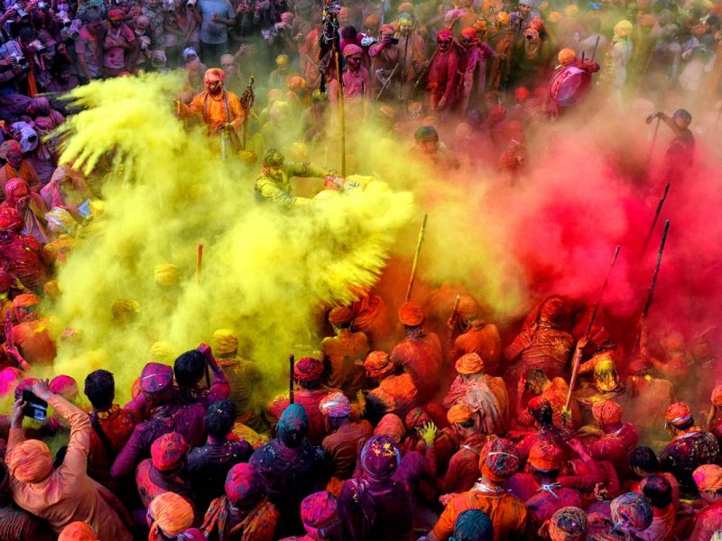 People celebrating in colour at the Holi - Festivals around the world 2023