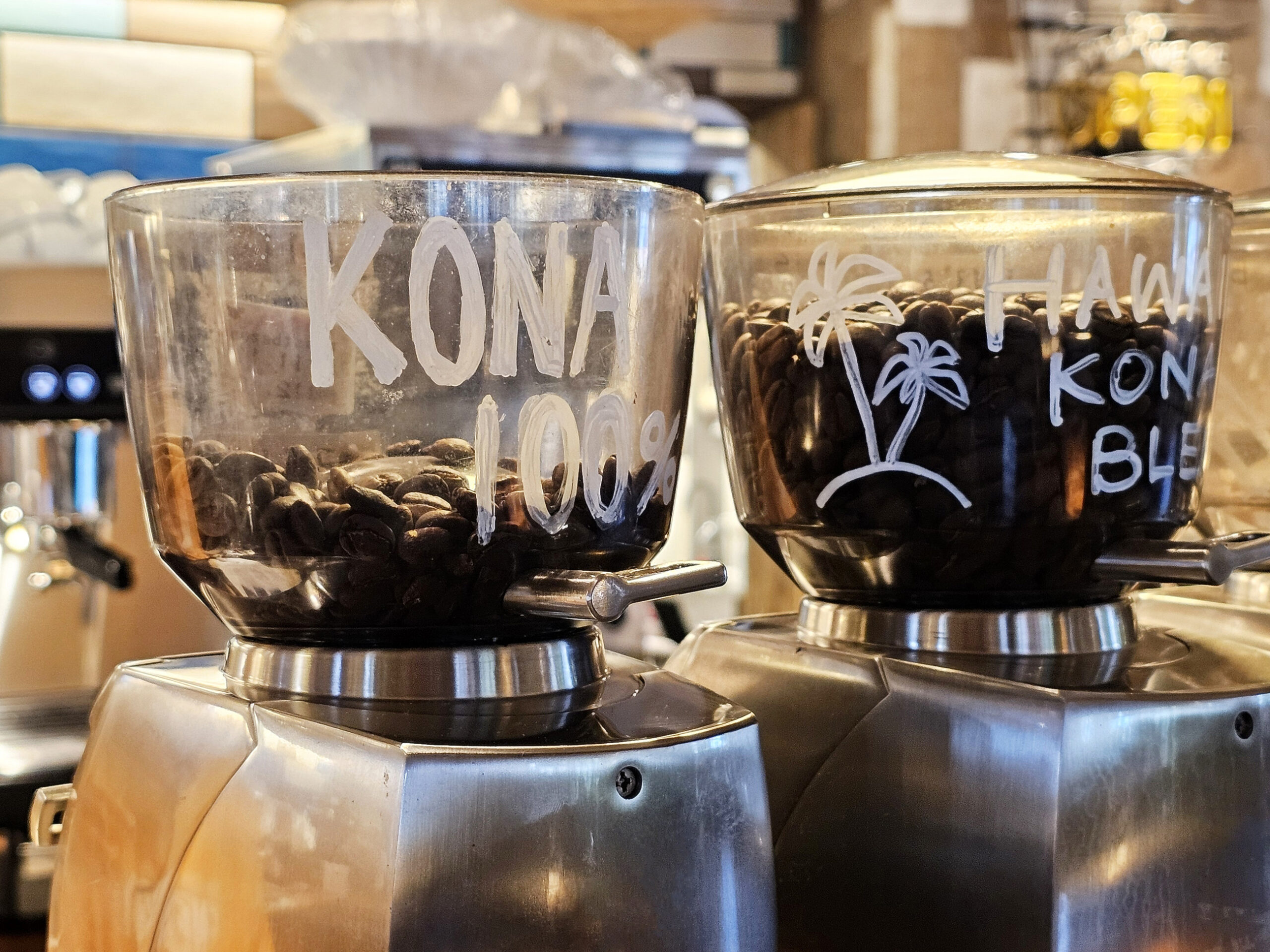 Kona Coffee Beans in coffee grinders