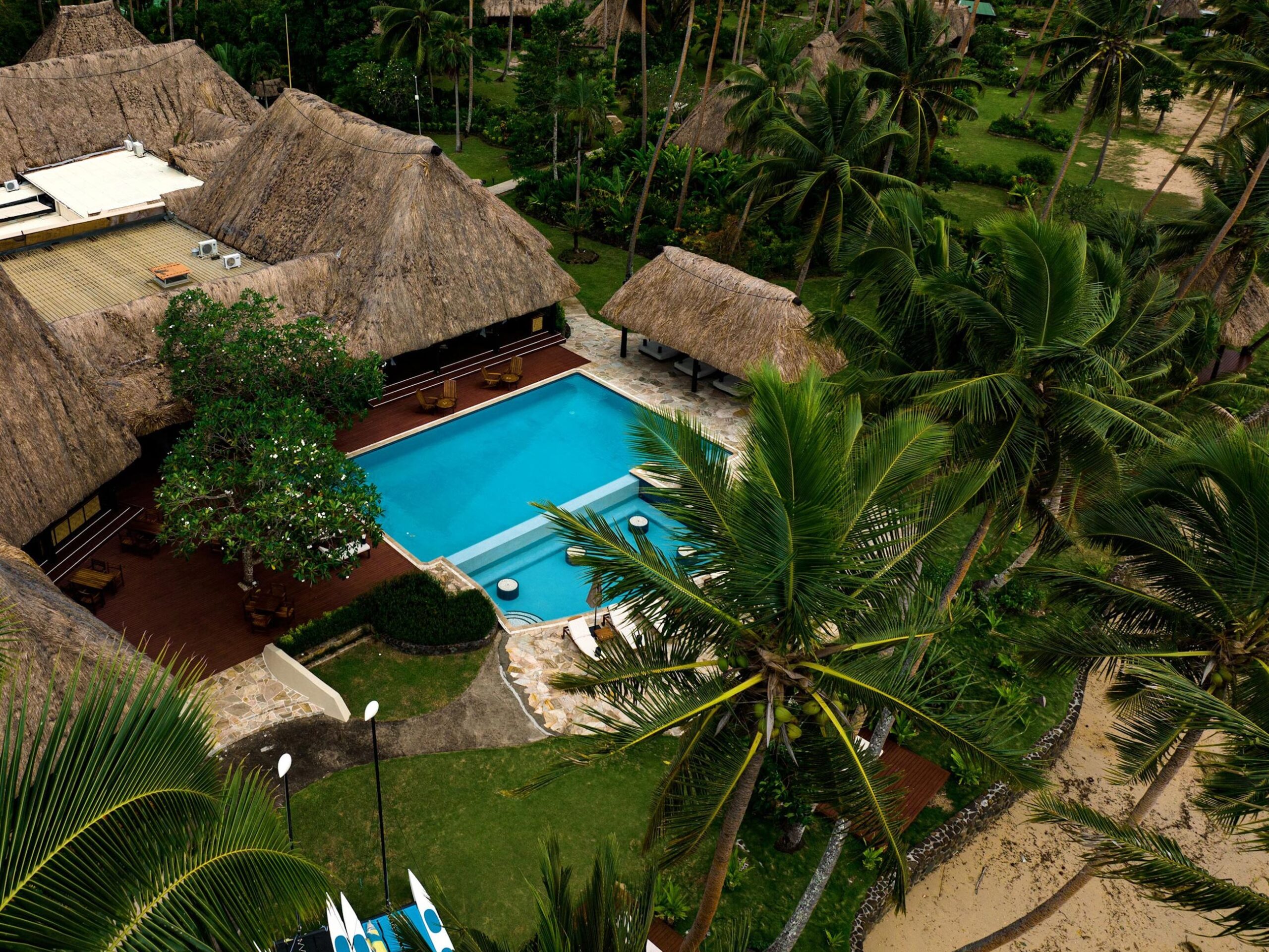 Fijian bures with pool at Jean-Michel Cousteau Resort