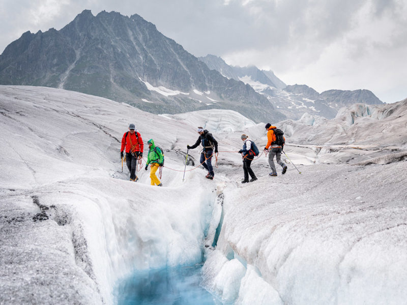 Hikers in the Great Aletsch Glacier, Swiss Alps, Switzerland