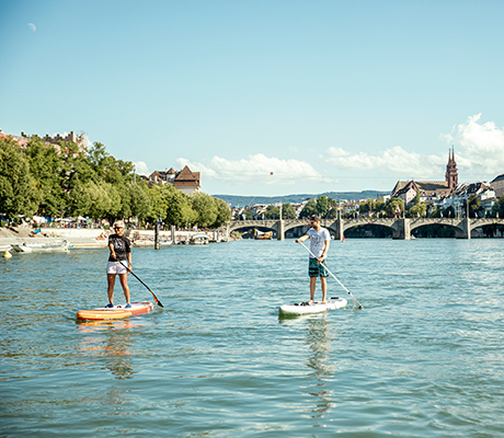 Paddle boarding along Basel River Switzerland