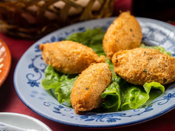Bacalhau (cod fish cakes) are a must-try Macau snack