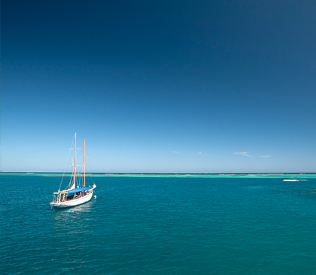 Yacht anchored at sea, Fiji