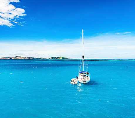 Yacht anchored at sea, Fiji