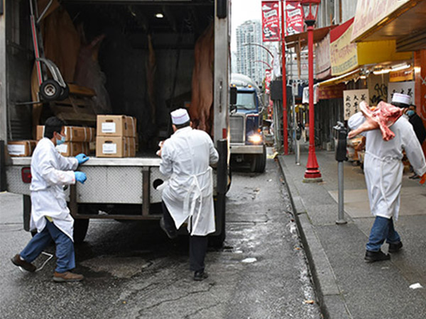 People Unloading Meat, Restaurant Chef, Vancouver, Canada