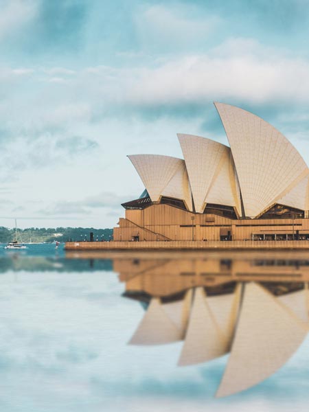The Sydney Opera House and its reflection off the Harbour
