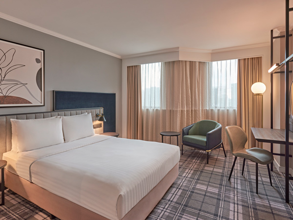 a modern and cosy deluxe room at Vibe Hotel Singapore