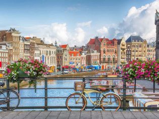 Amsterdam, capital of the Netherlands, has more than one hundred kilometres of canals, about 90 islands and 1,500 bridges.