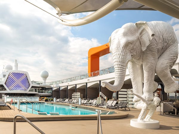 The Celebrity Beyond resort deck with a 25-yard lap pool and white elephant. (Image: Celebrity Cruises)
