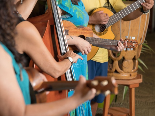 On ‘Aloha Friday’ staff perform local music and dance. (Image: Susan Gough Henly)