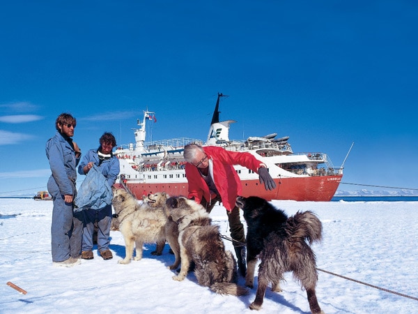 Lars Eric Lindblad and his ship Lindblad Explorer in Antarctica. (Image: Lindblad Expeditions)