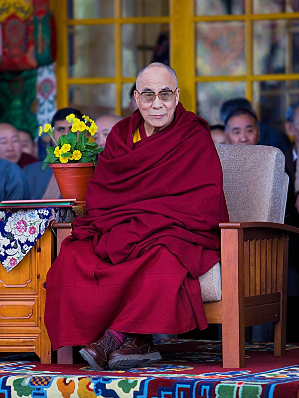 Dalai Lama sitting on his throne at Namgyal Monastery