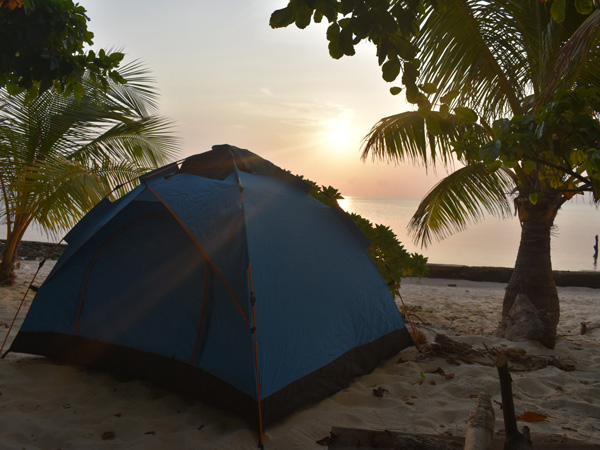 a tent on the beach during sunrise, Balabac, Palawan