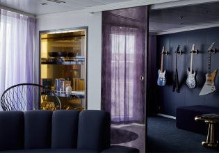 a media room stocked with four guitars at the massive suite, Virgin Voyages’ Resilient Lady