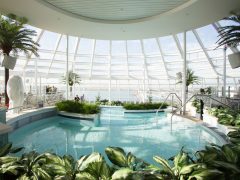 an indoor pool onboard Royal Caribbean Quantum of the Seas