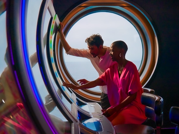 two people playing casino onboard Virgin Voyages’ Resilient Lady