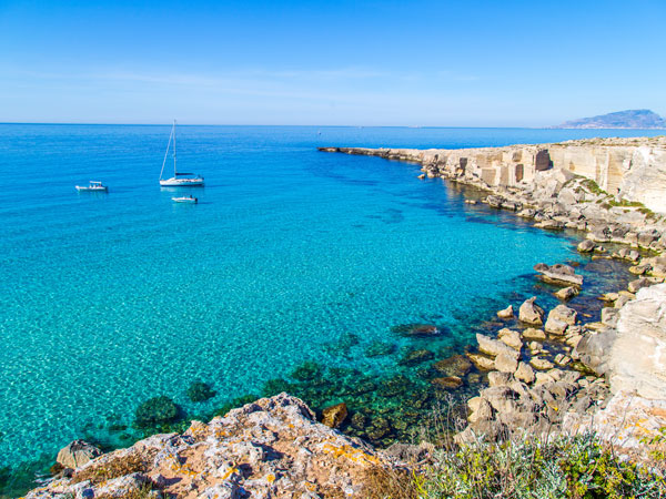 a clear blue lagoon in Favignana Island, Sicily