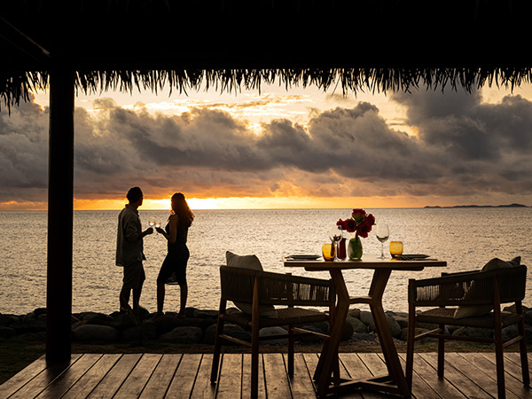 Sheraton Fiji Golf & Beach Resort sunset at waterfront Tatavu Fiji Grill & Bar