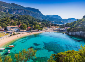 an aerial view of a beach in Corfu, Greece