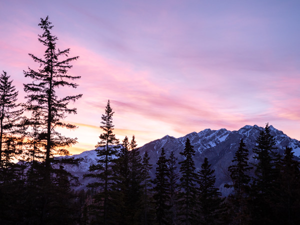 a pastel-hued sky over the famous Rockies, Fairmont Banff Springs