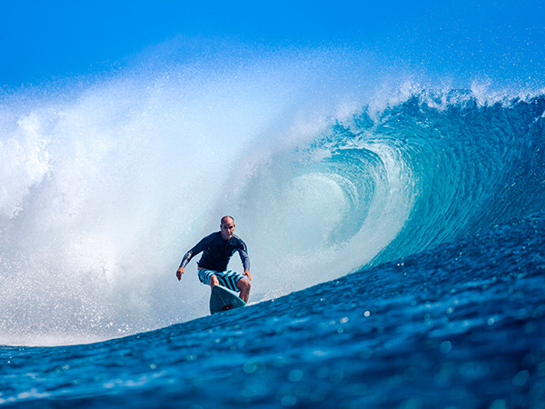 Surfing Cloudbreak in fiji