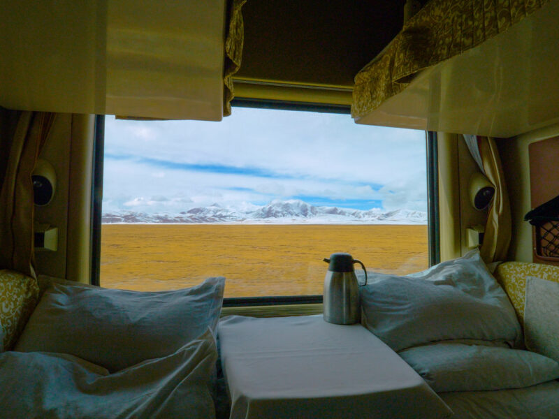 a sleeper train crossing the scenic Tibetan landscape