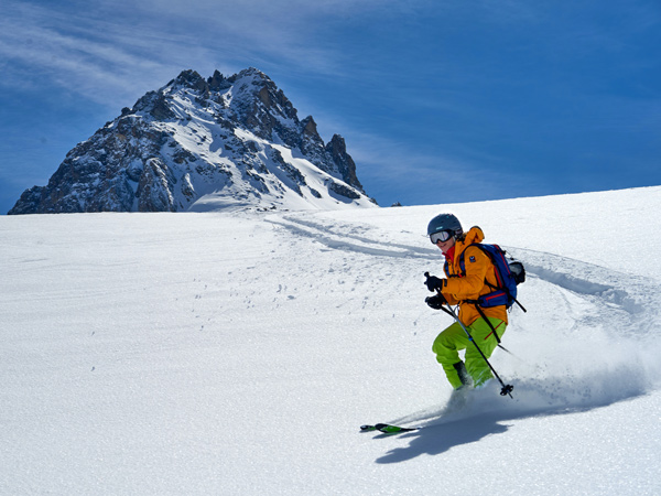 a man enjoying his time skiing