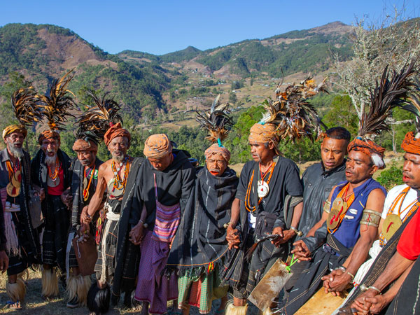 the locals in Rabilau village doing a ritual in the mountains of Timor-Leste